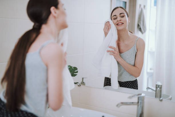 istock Delighted young woman is using her towel 1135098525