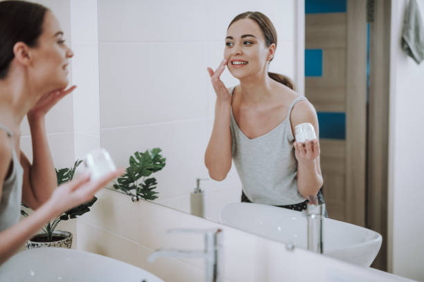 istock Joyful nice woman looking in the mirror 1135098530