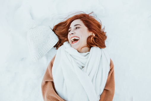 Happy woman on winter vacation