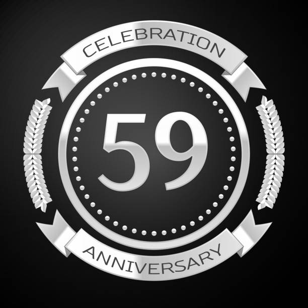 istock One Years Anniversary Celebration Design. Silver ring and ribbon on black background. Colorful Vector template elements for your birthday party 1135100534