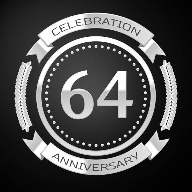 istock One Years Anniversary Celebration Design. Silver ring and ribbon on black background. Colorful Vector template elements for your birthday party 1135100617