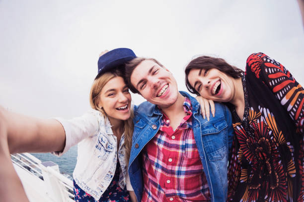 Selfie, Dubai, Travel, Friendship - Friends taking a Group Selfie near Dubai Marina