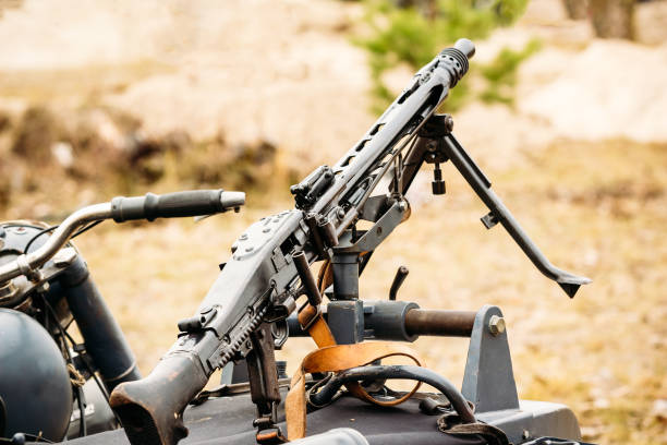 Machine gun mg-42 on a motorcycle MG-42 machine gun mounted on a motorcycle number 42 stock pictures, royalty-free photos & images