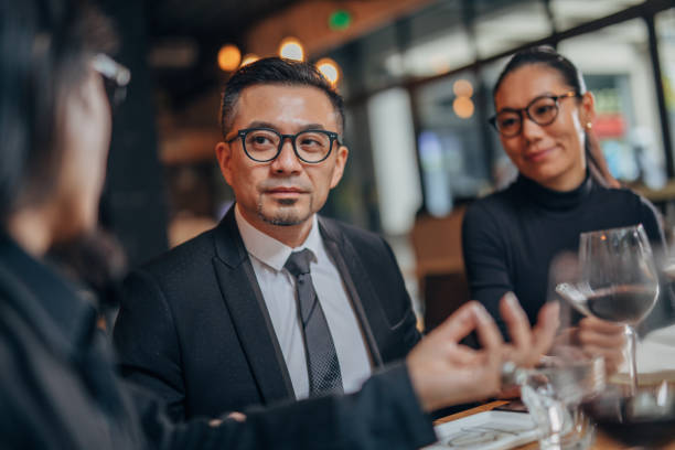 istock Modern business people on meeting in restaurant 1135106616