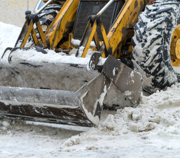 istock Tractor shoveling snow on the street. 1135108108