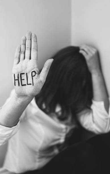 istock Depressed woman in corner. Social problems concept. Place for your text. 1135108232