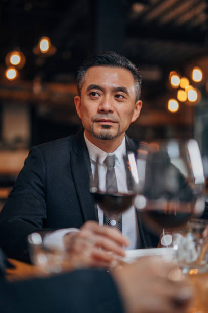 istock Handsome businessman in restaurant 1135108397
