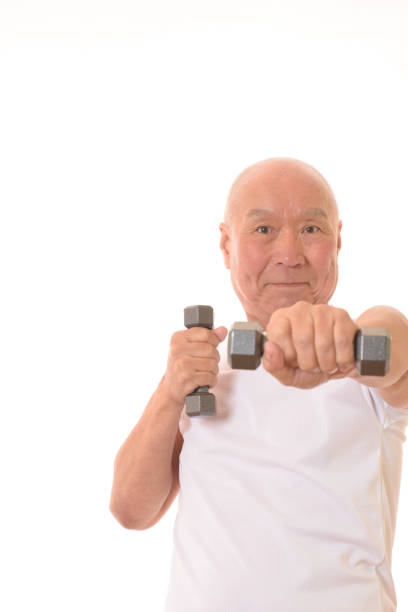 istock Dumbbell and Japanese senior 1135108646