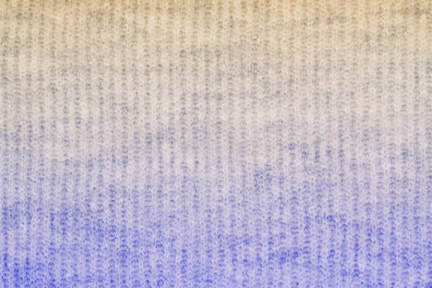 istock Sweater or scarf texture large knitting. Knitted jersey background with a relief pattern. Braids in knitting. Wool hand-knitted or machine knitting pattern. Fabric Background. 1135109374