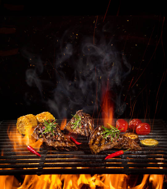 istock Beef steaks on the grill with flames 1135111038