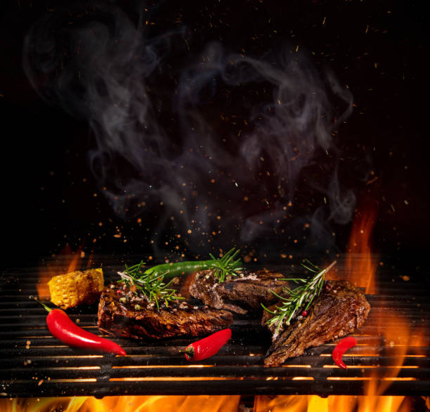 istock Beef steaks on the grill with flames 1135111066