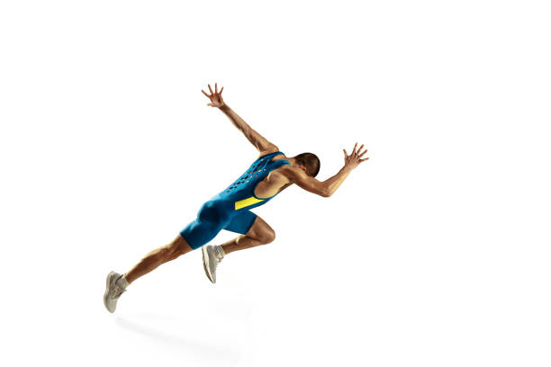 istock Young caucasian man running or jogging isolated on white studio background. 1135111656