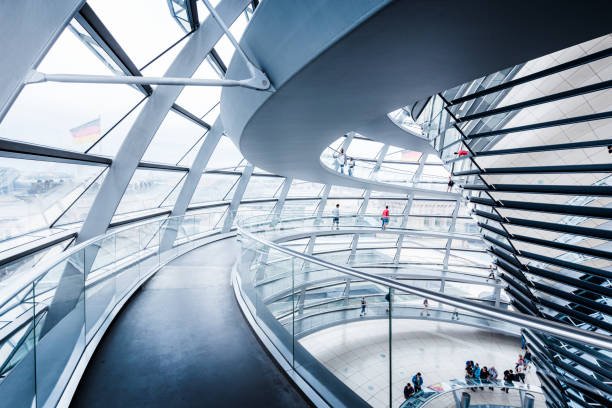Berlin Reichstag Dome, Germany BERLIN - JULY 19, 2015: Interior view of famous Reichstag Dome in Berlin, Germany. Constructed to symbolize the reunification of Germany it's now one of Berlin's most important landmarks. bundestag photos stock pictures, royalty-free photos & images