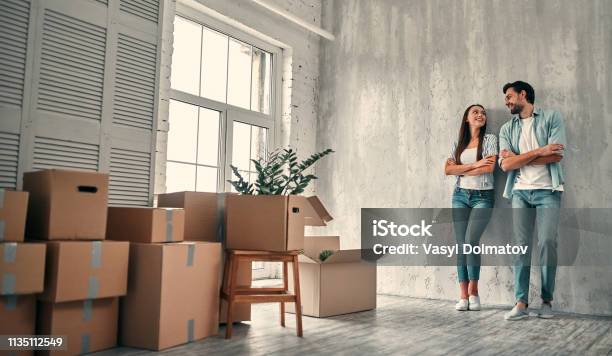 Couple On Moving Day Stock Photo - Download Image Now - Moving House, Family, House