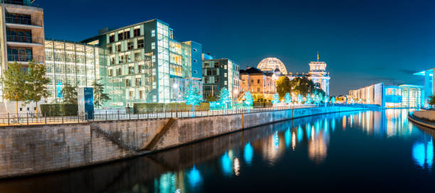 istock Berlin government district with Spree river at twilight, central Berlin Mitte, Germany 1135113317