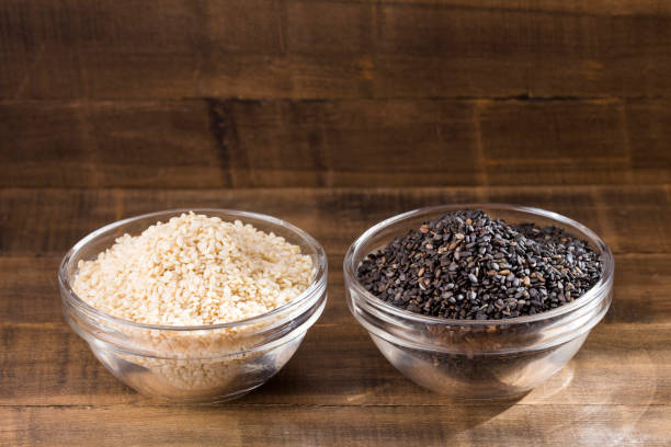 istock White sesame and black sesame seed - Sesamum indicum 1135115054