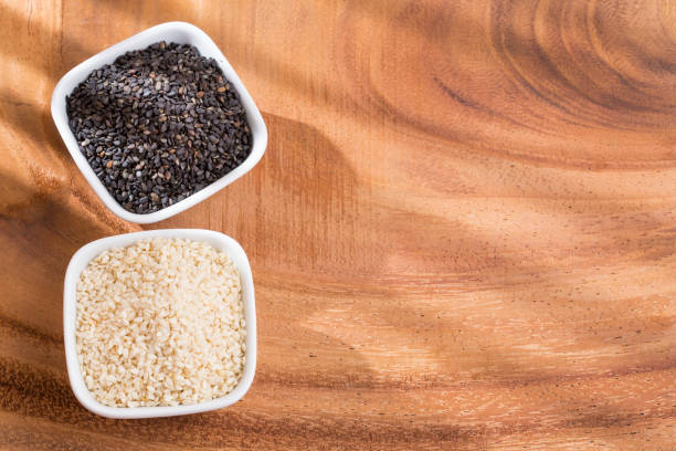 istock White sesame and black sesame seed - Sesamum indicum 1135116629