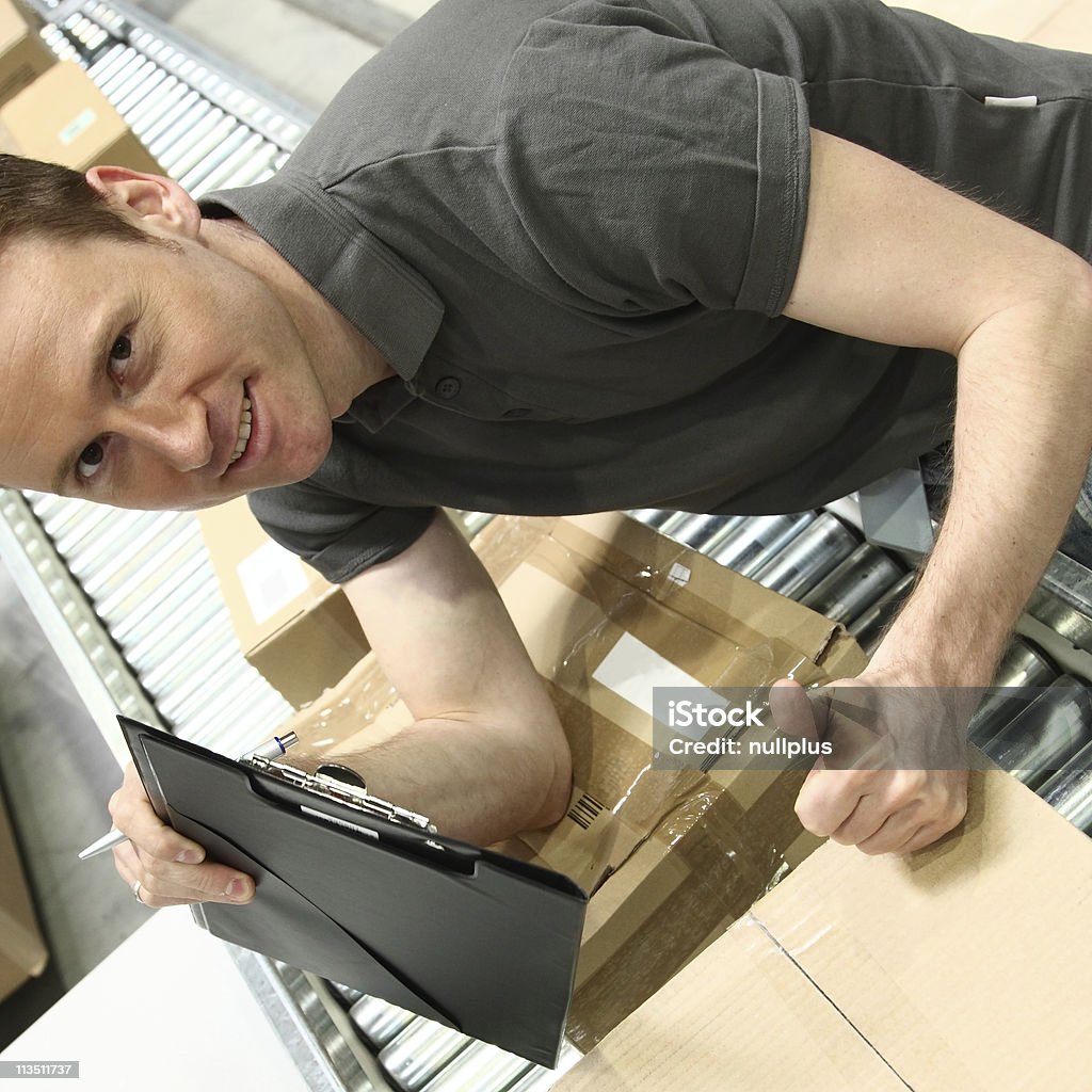 delivery boy series delivery guy handling your recent online order 30-39 Years Stock Photo