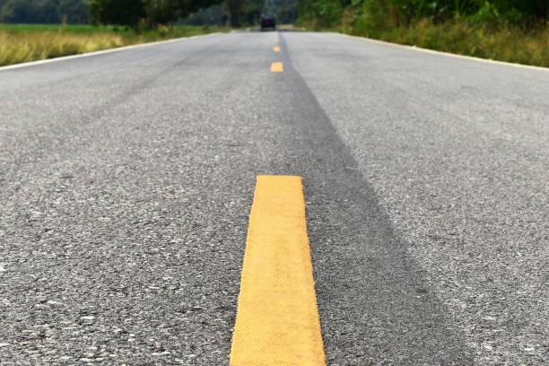 istock dirty old asphalt in countryside 1135117943