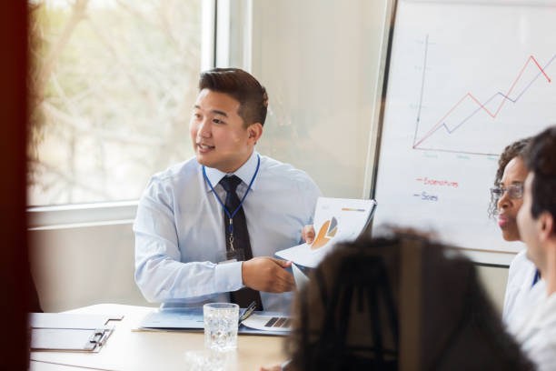 istock Confident businessman meets with doctors 1135118099