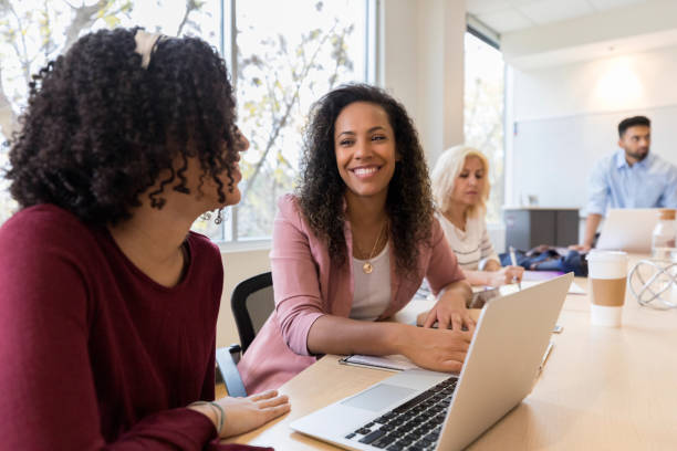 istock Two female design professionals work on a plan 1135118240