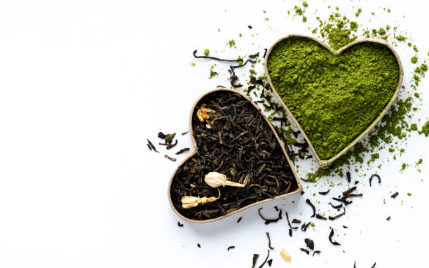抹茶とジャスミンの緑茶 - tea tea leaves jasmine tea leaf ストックフォトと画像