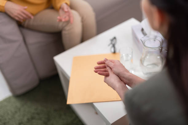 istock High angle of documents lying on table during conversation in consulting room 1135120874