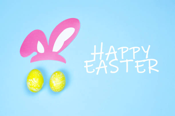 istock Two eggs and ears imitating the face of the Easter Bunny. 1135121540