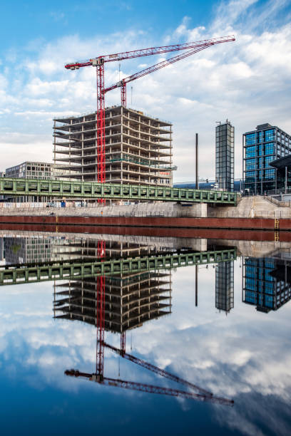 istock Modern architecture and water reflection in Spree river, Berlin 1135122725