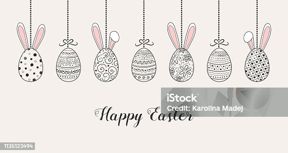 istock Easter banner with hanging eggs and funny bunnies. Vector 1135123494