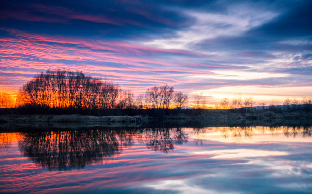 istock Reflections of sunset at the lake 1135124192