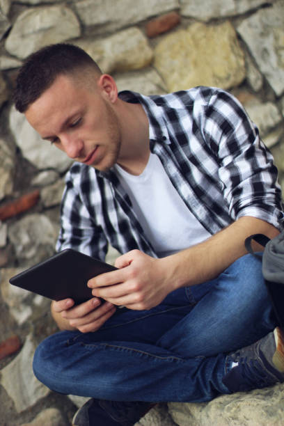 istock Young businessman with tablet working 1135125340