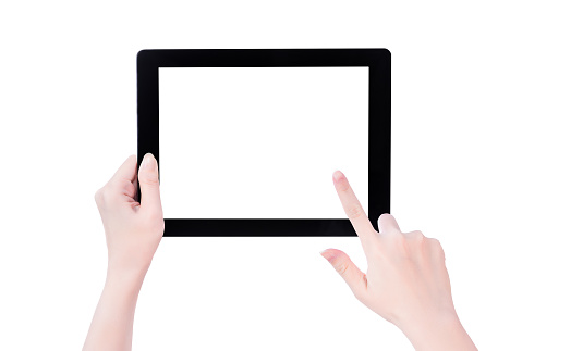 Young beautiful girl holding a black tablet pc template with white screen isolated on white background, close up, mock up, clipping path, cut out