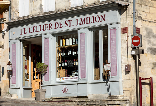 Saint Emilion, France - September 8, 2018: Exterior of a wine shop in Saint Emilion in France. St Emilion is one of the principal red wine areas of Bordeaux and very popular tourist destination.