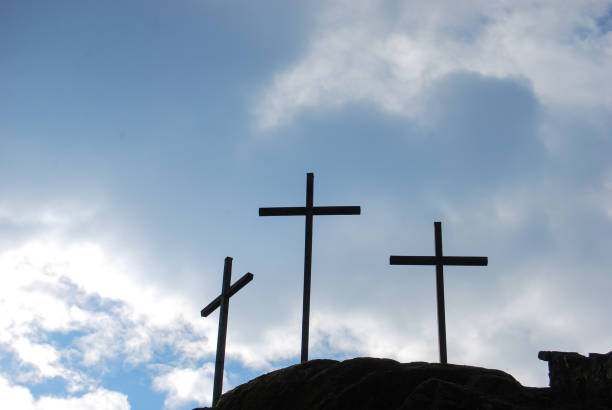 istock Trinity with three big christian crosses outside 1135131590