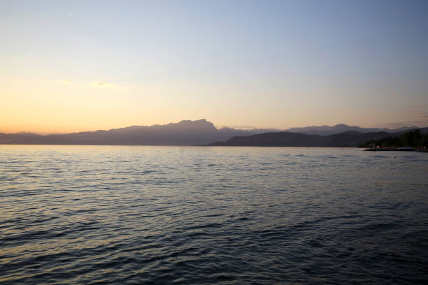 istock Beautiful sunset at Garda lake in Italy 1135131999