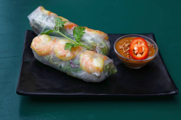istock Spring rolls with shrimps and dipping chili sauce 1135135006