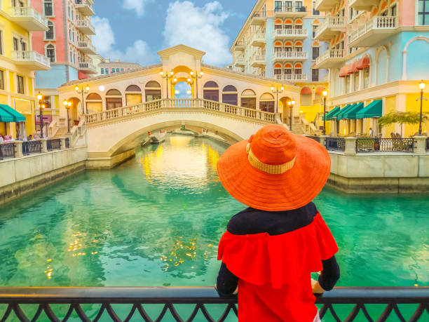 istock Woman in Venice Doha twilight 1135136622