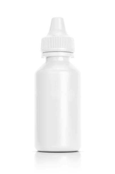 white eyedropper bottle isolated on white background white eyedropper bottle isolated on white background with clipping path ready for medicated product design mock-up eyedropper stock pictures, royalty-free photos & images