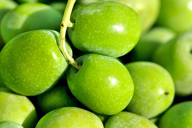 istock Closeup of green olives. 113514157