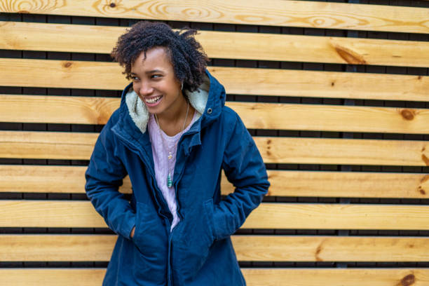 istock girl model afroamerican posing outdoor 1135142572