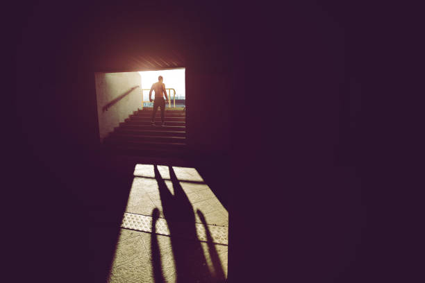 istock Muscular man on a staircase 1135143675