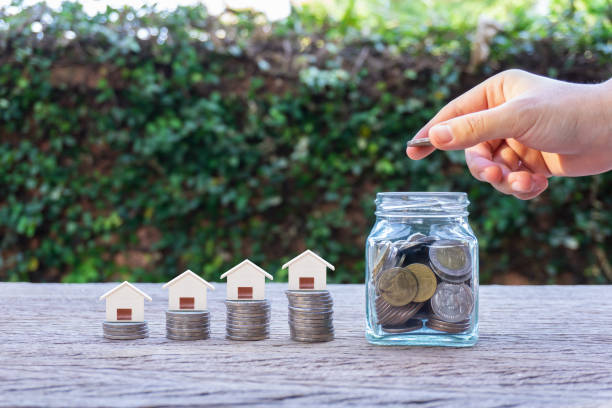 istock Saving for buying house or real estate investment program concept. 1135143691