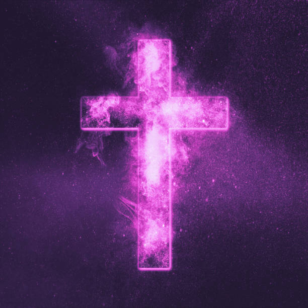 istock Christian cross symbol. Abstract night sky background. 1135144104