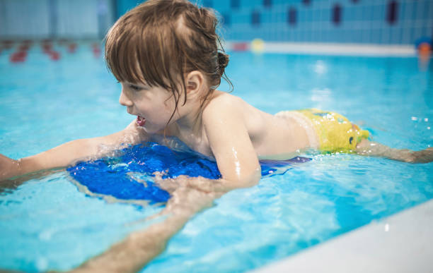 istock Young Toddler Learning to Swim 1135148174