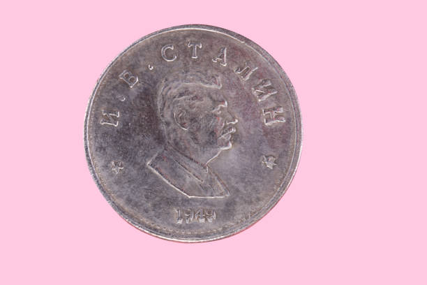 istock Russian coin 1 ruble 1949 CCCP isolated on pink 1135148564