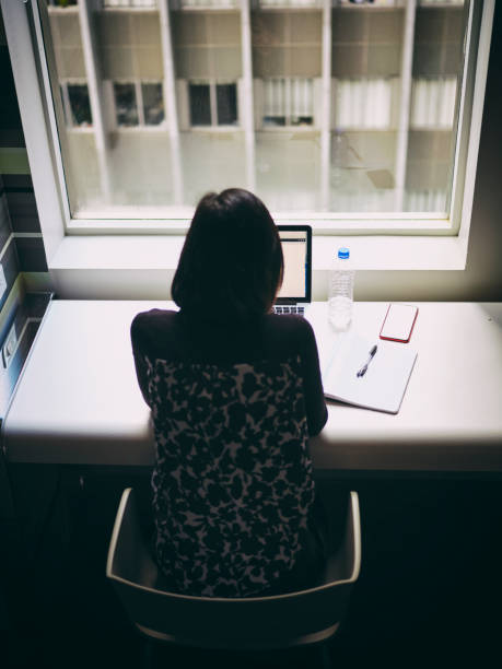 istock Japanese Woman Working By a Window 1135149290