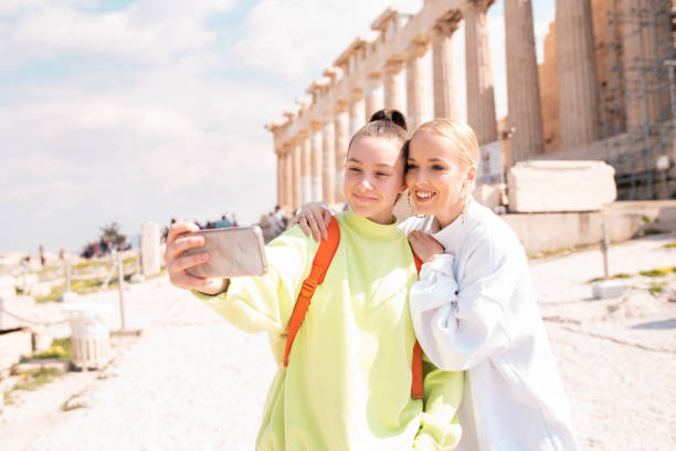 istock Two young female tourists in Acropolis - Athens 1135149558