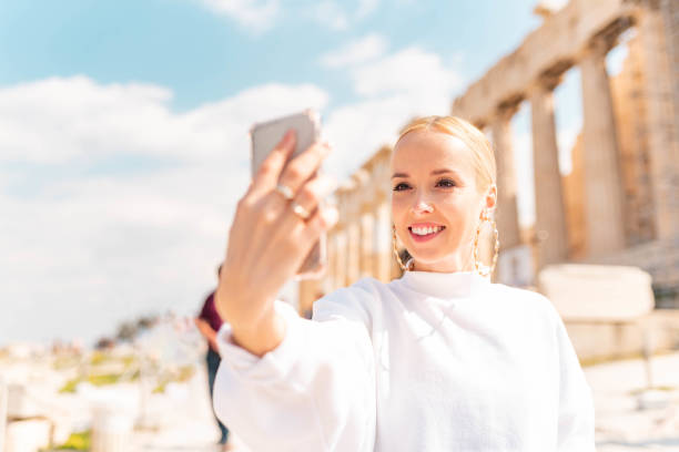 istock Female tourist in Acropolis - Athens 1135149575