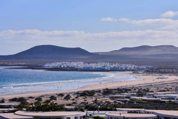 Landscape in Tropical Volcanic Canary Islands Spain Spanish View Landscape in Tropical Volcanic Canary Islands Spain caleta de famara lanzarote stock pictures, royalty-free photos & images
